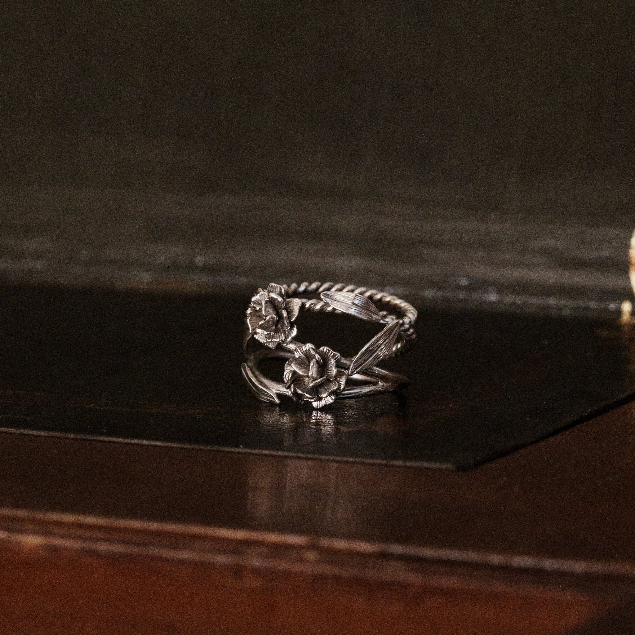 Front view of a 925 sterling silver baby breath flower shaped ring with multiple flower & leaf details