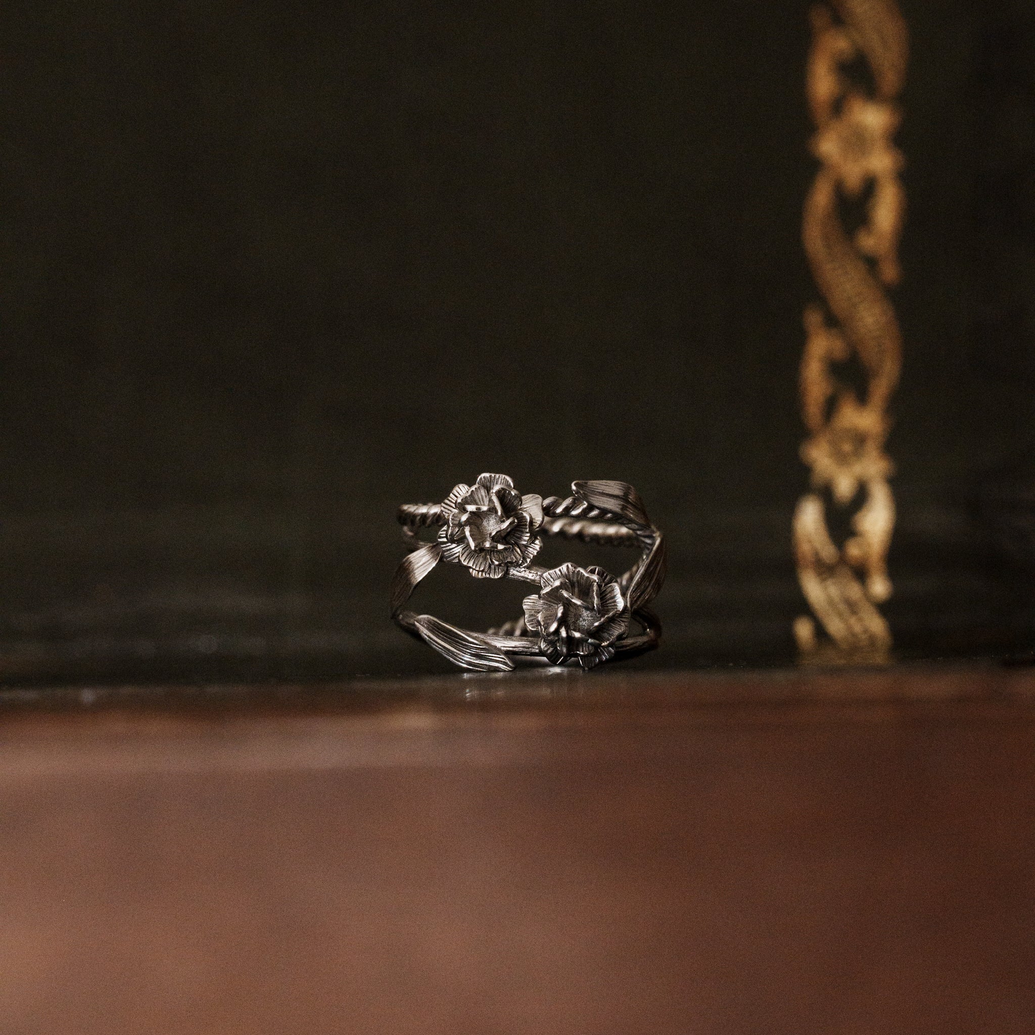 a 925 sterling silver baby breath flower shaped ring with multiple flower & leaf details in a closer look